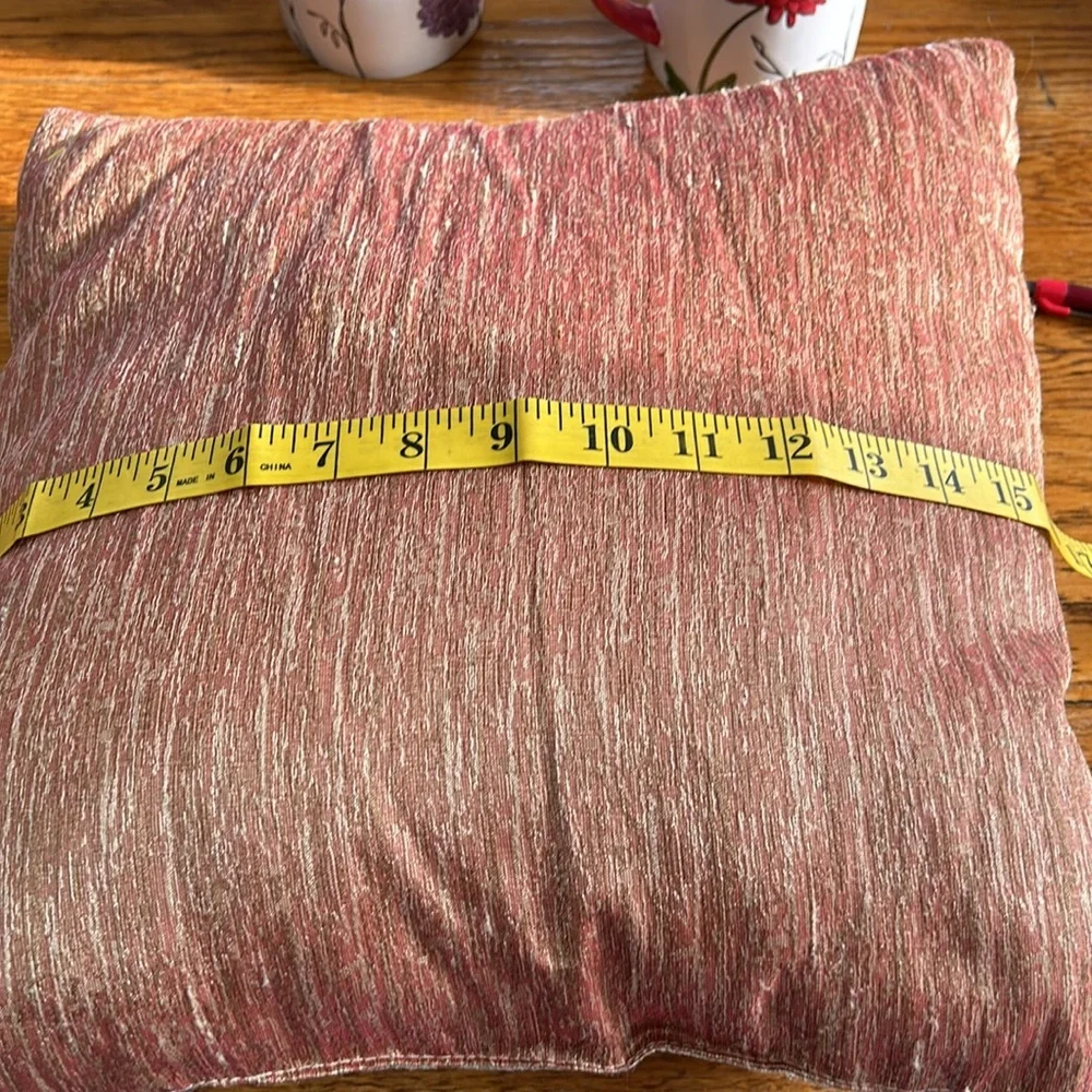 Unbranded braided cord accent pillow. Approximately 16” square.